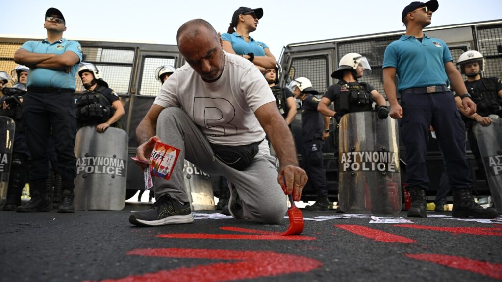 Greek riot police in Piraeus block pro-Palestinian protesters from reaching Crown Iris cruise ship Greek riot police in Piraeus block pro-Palestinian protesters from reaching Crown Iris cruise ship