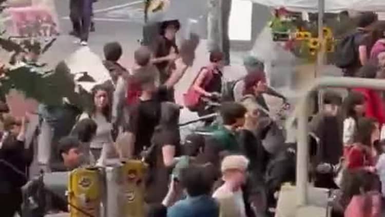 Overtourism protesters march in Mexico City, imploring rich people to 'get out'