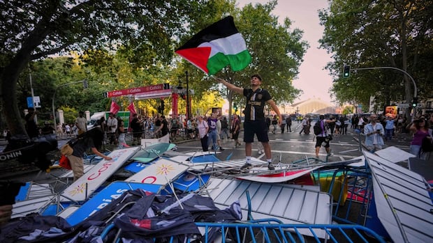 Spain cycling event cut short after more than 100,000 protest Israeli-owned team