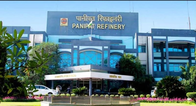 What steps have been taken for restoration of environment in villages near oil refinery