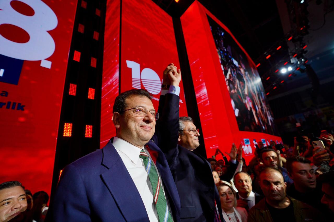 Ekrem Imamoglu raises hand of Ozgur Ozel who is elected chairman at CHP 38th Ordinary Congress and celebrates, Ankara, Turkiye, Nov 5, 2023. (@ekrem_imamoglu via X)