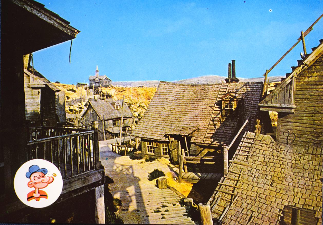 A Popeye Village postcard by David Moore. Identical cards also by Penprint Ltd