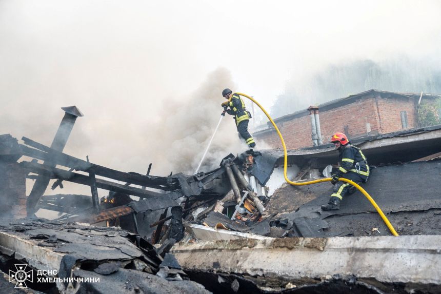 Firefighters work at the site of Russian drone and missile strikes in Khmelnytskyi, Ukraine, on Wednesday.