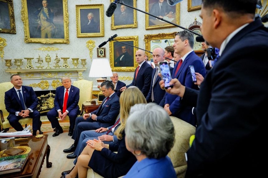 US President Donald Trump and Polish President Karol Nawrocki speak during a meeting in the Oval Office on Wednesday.