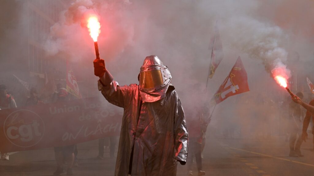 Dozens of arrests as protests and general strike sweep France