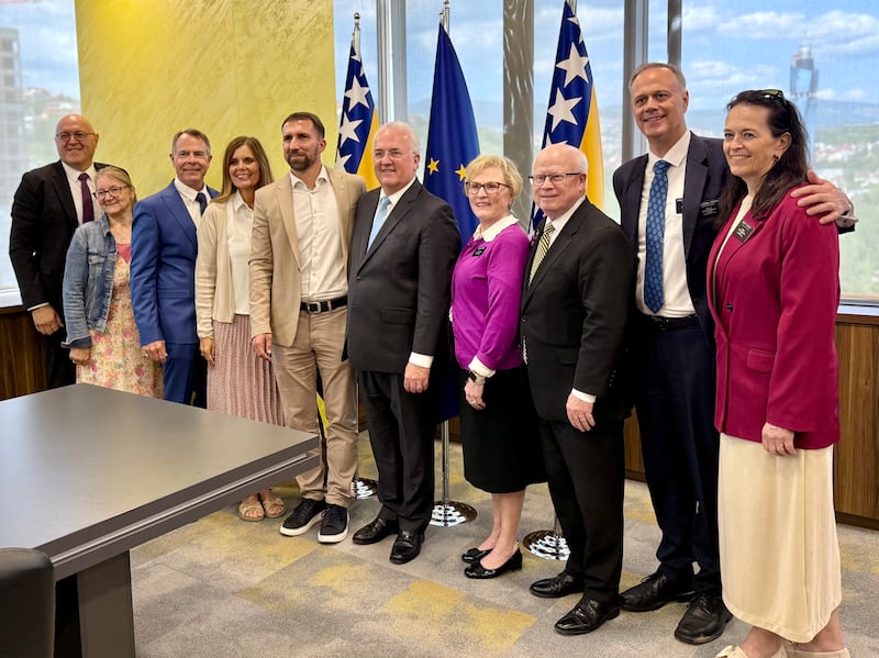 Representatives of The Church of Jesus Christ of Latter-day Saints pause for a photo with Adnan Delić, center left, minister of labor and social policy in Bosnia-Herzegovina, in his office in Sarajevo, Bosnia-Herzegovina, in August 2025.