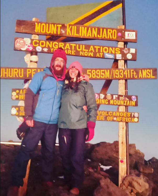 Rita Saliba on top of Mount Kilimanjaro.