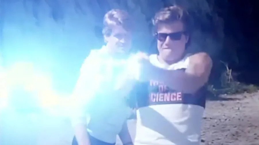 Mark Thomas Miller shoots lightning as Johnny B in <em>Misfits of Science</em>.