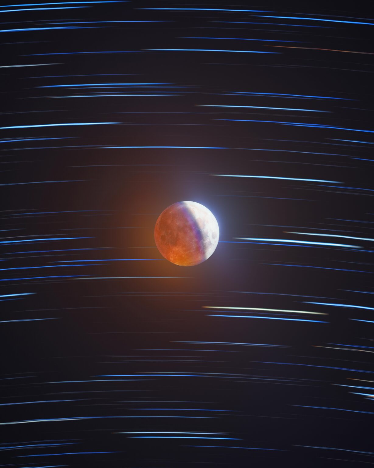 I used two telescopes and thousands of photos to create an image capturing the motion of the moon against the stars. The trick was doing it while under Earth's shadow during a lunar eclipse! [OC]