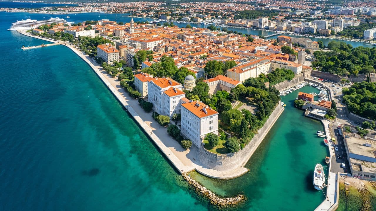 Aerial view of the Zadar town in Dalmatia region of Croatia. Beautiful Zadar cityscape at sunny summer day. Historical center of Zadar town top view. UNESCO's World Heritage Site
