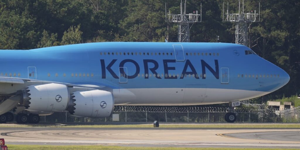 South Korean workers detained in immigration raid leave Atlanta and head home