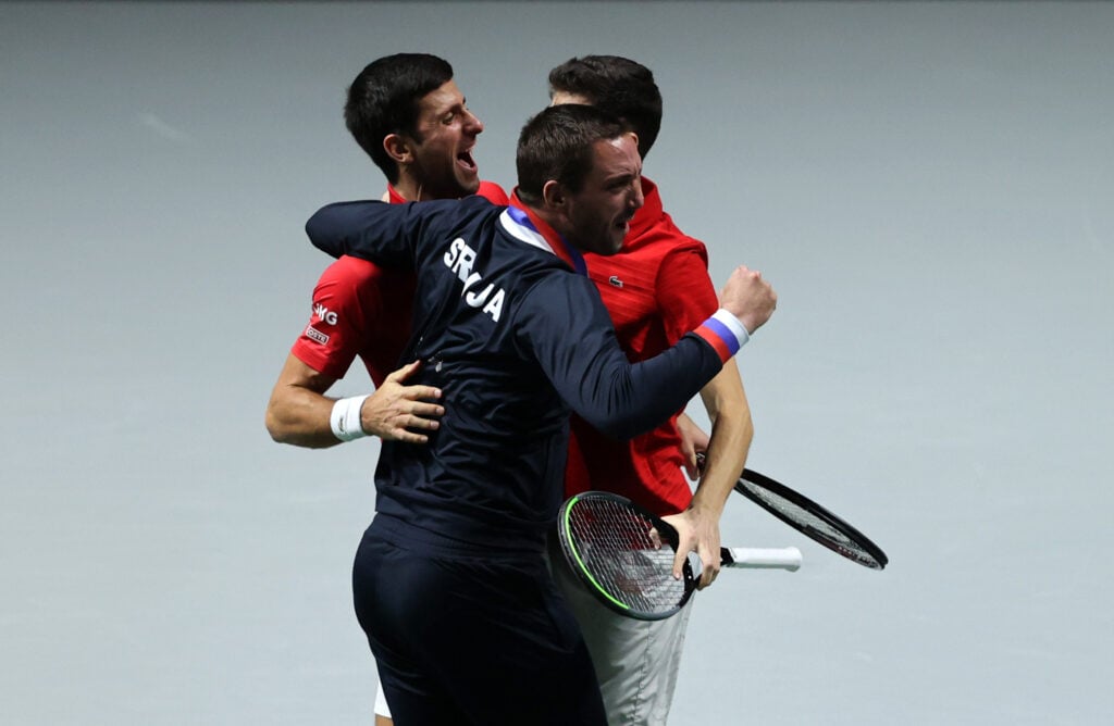 Viktor Troicki celebrating with Novak Djokovic at the 2021 Davis Cup