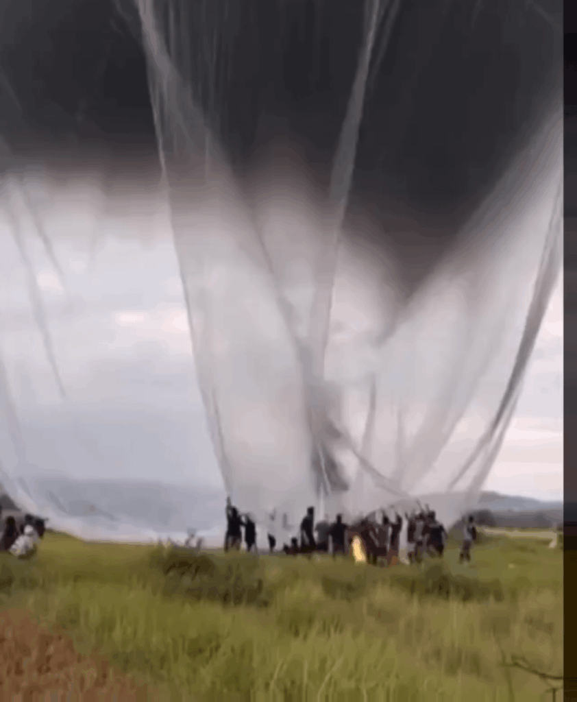 Скопје односно: Smoke trapped in a plastic bag to demonstrate how one fire can generate significant pollution.