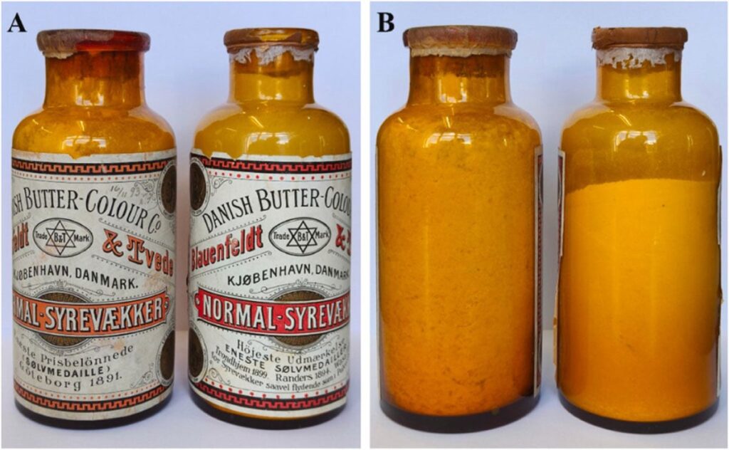 Two Antique Glass Bottles Containing Yellow Powder