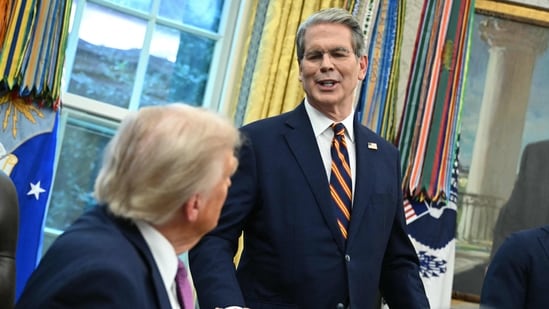 US President Donald Trump listens to Secretary of the Treasury Scott Bessent at the White House.(AFP File)