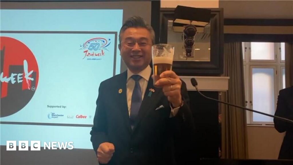 Cheers as Japanese ambassador downs pint of bitter during city visit - BBC News