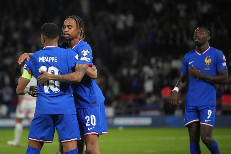Bradley Barcola and Kylian Mbappe were on target for France (Christophe Ena/AP)