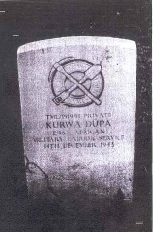 The tombstone of a deceased Polish soldier who was a truck driver in Kenya.