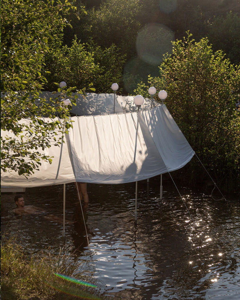 ephemeral circle textile installation by atelier VRAC activates mountain river in romania