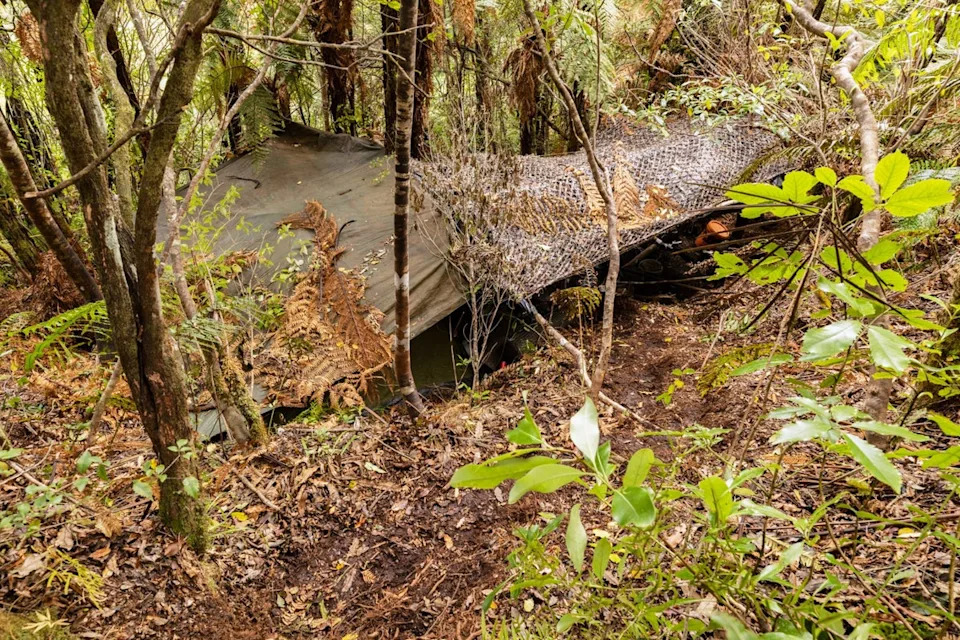A hidden bush campsite near Waitomo, where fugitive Tom Phillips and his children were living, shown in photos released by New Zealand Police (AP)