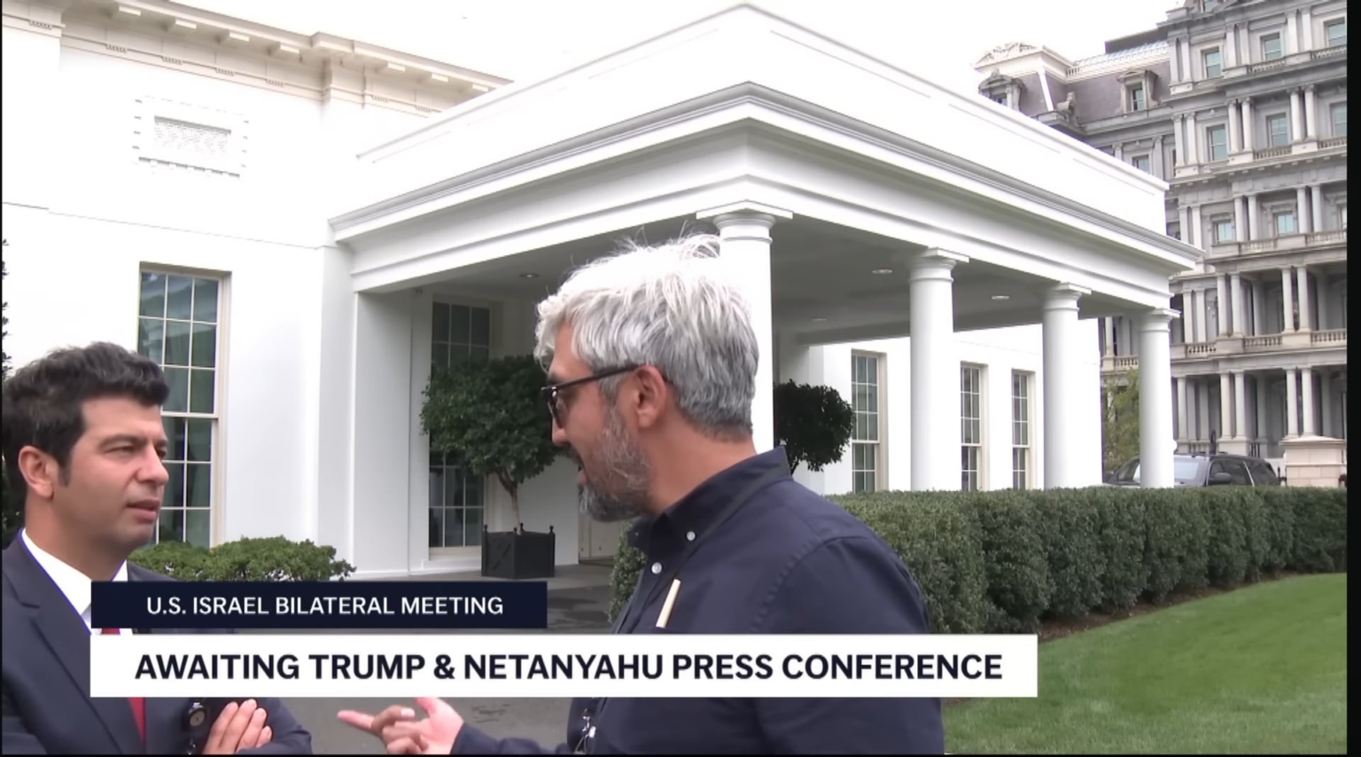 NTV US representative Hüseyin Günay describes his thoughts without noticing the EP camera.