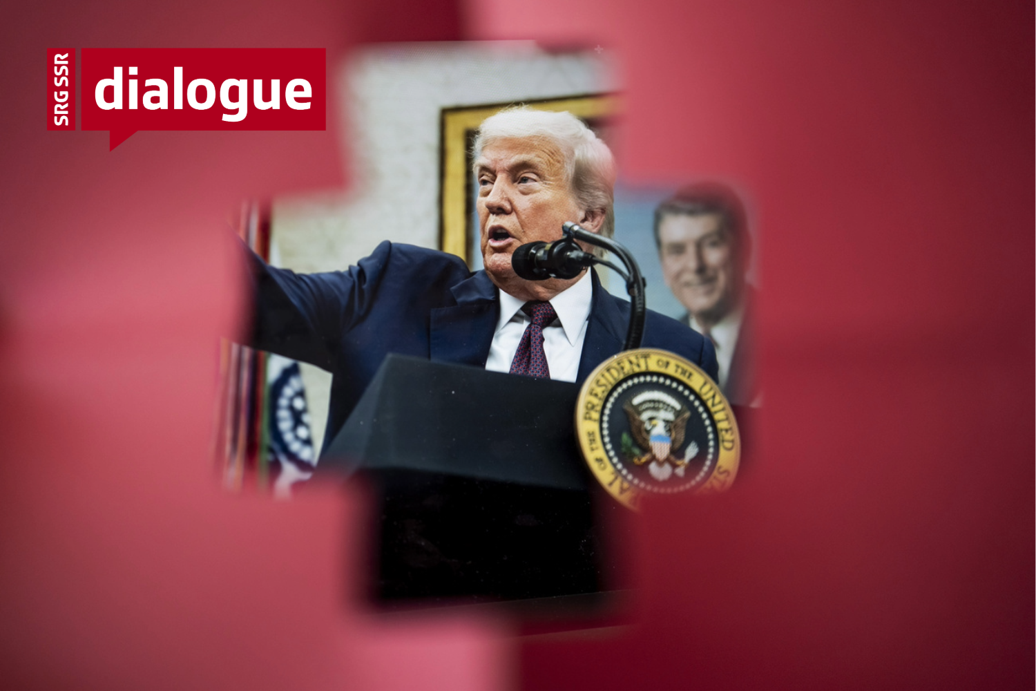 Photo taken of US president Donald Trump through a Swiss cross