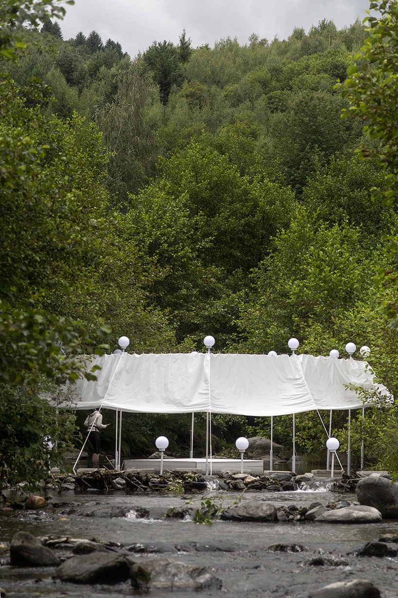ephemeral circle textile installation by atelier VRAC activates mountain river in romania