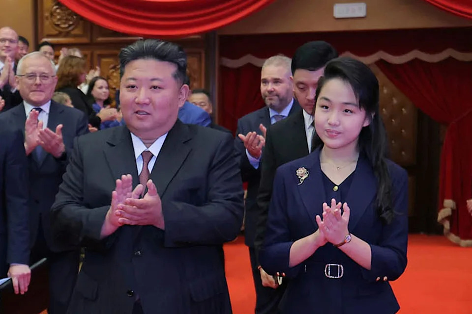 North Korean leader Kim Jong Un and his daughter arrive at the East Pyongyang Grand Theatre (AP)