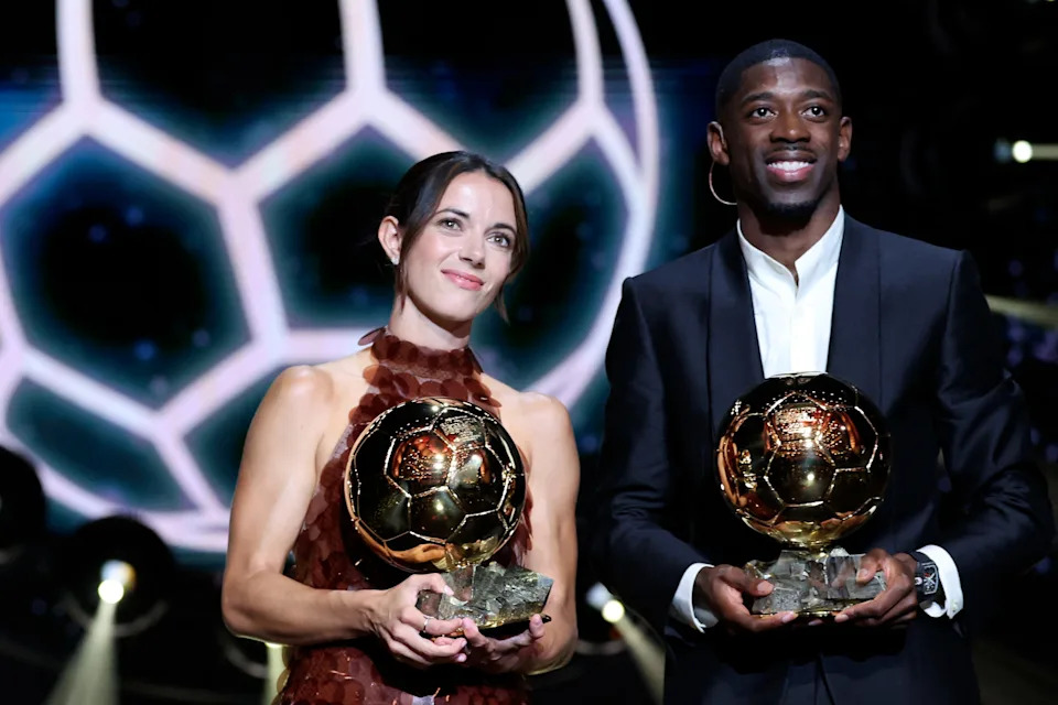 Aitana Bonmati and Ousmane Dembele pose after receiving the Ballon d'Or awards at the Theatre du Chatelet in Paris on Sept. 22, 2025