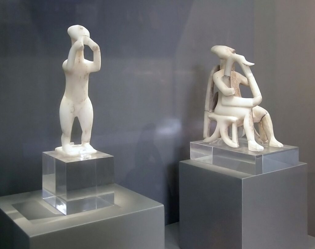 Figurines of an aulos player and harp player from Greece's Bronze Age island of Keros, which is now unpopulated