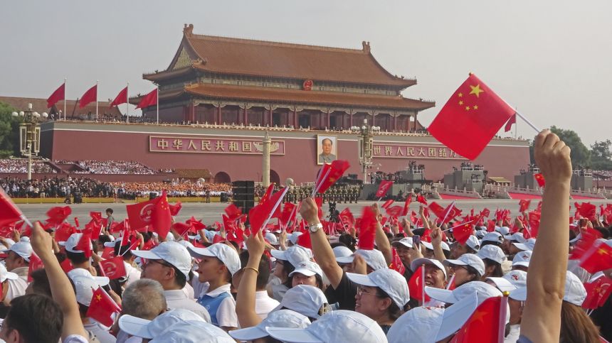 People gather at Tiananmen Square in Beijing on September 3, 2025, for a military parade marking the 80th anniversary of Japan's defeat in World War II.