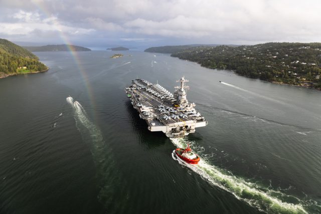 Aircraft carrier arrives as tensions rise