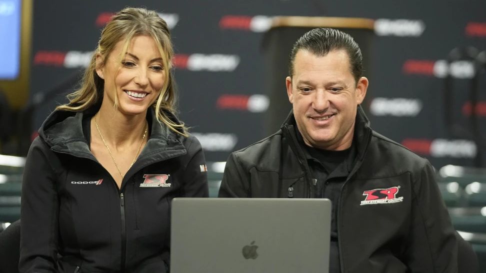Leah Pruett and her husband Tony Stewart speak during a news conference, Thursday, Dec. 7, 2023, in Indianapolis. (AP Photo/Darron Cummings, File)