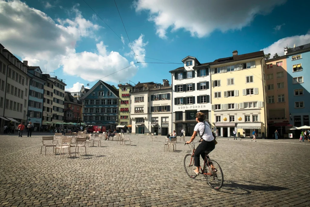 Person riding a bicycle safely in Zurich