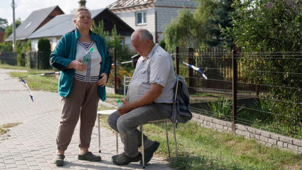 Poland Investigates House Hit During Drone Incident ━ The European Conservative Alicja Wesolowska and her husband Tomasz Wesolowski in front of their damaged house reportedly destroyed by debris from a shot down Russian drone in the village of Wyryki-Wola, eastern Poland, on September 10, 2025.