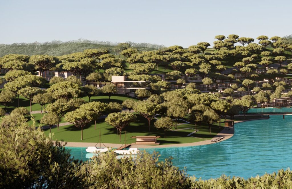 Luxury resort development surrounded by pine trees along a coastal bay