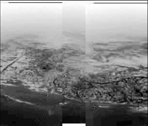 This picture from Titan taken by the Huygens probe always confused me. Is it a shoreline or not?