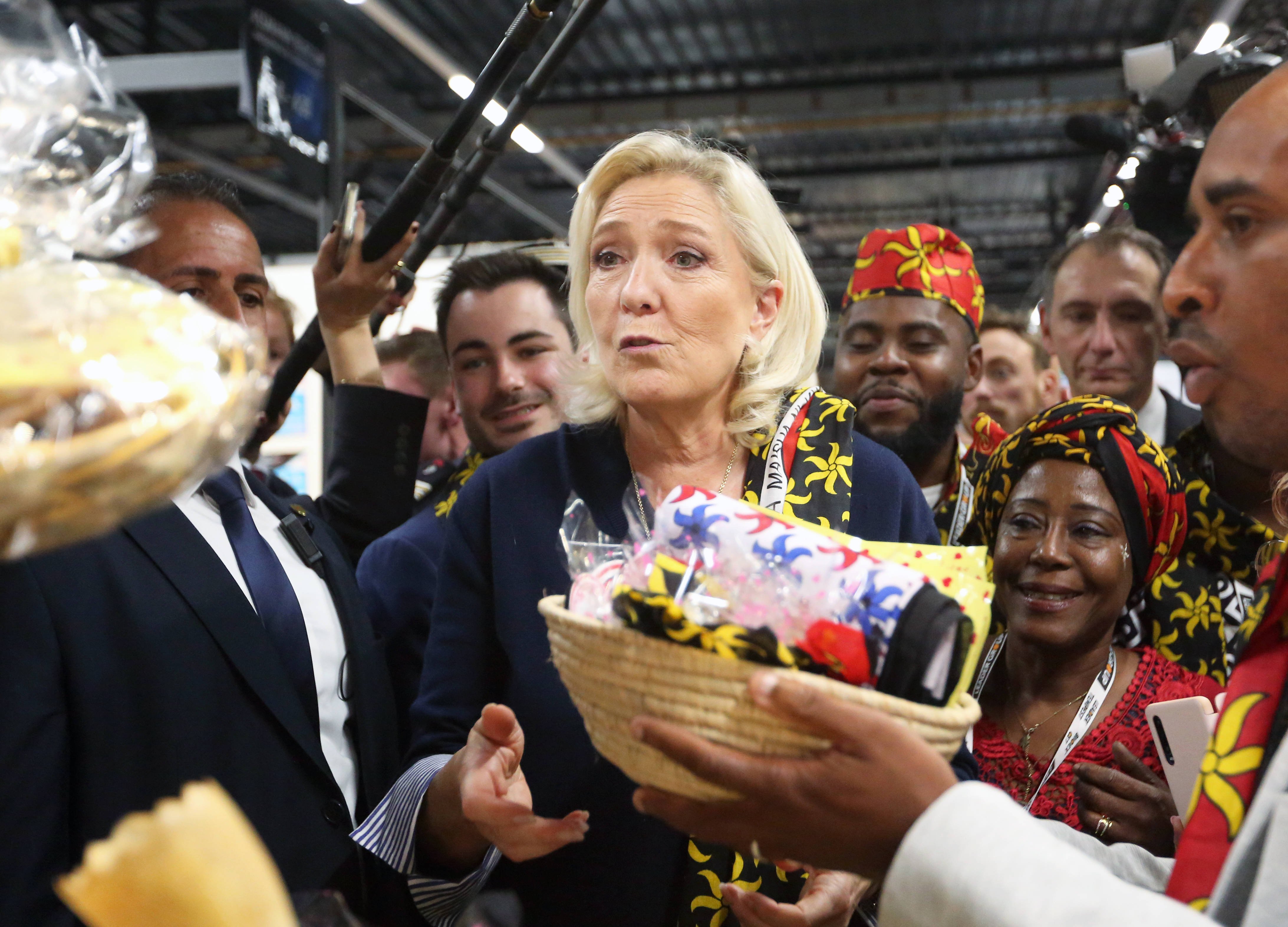Marine Le Pen and Marie-Caroline Le Pen waiting at the firefighters' national congress.