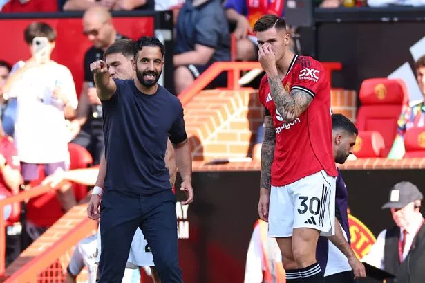 MANCHESTER, ENGLAND - AUGUST 17: Ruben Amorim the head coach / manager of Manchester United instructs Benjamin Sesko of Manchester United as he comes on  during the Premier League match between Manchester United and Arsenal at Old Trafford on August 17, 2025 in Manchester, England. (Photo by Robbie Jay Barratt - AMA/Getty Images)