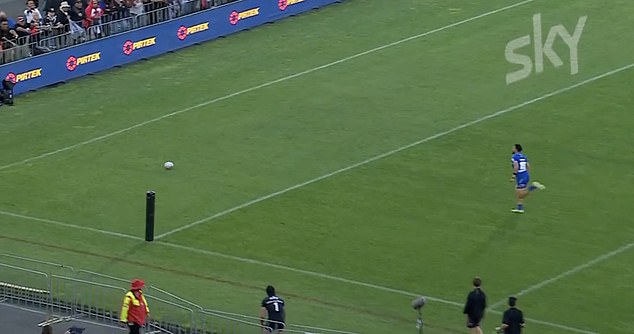 The ball subsequently bounced back into play, with Simi Sasagi (right) racing onto the loose ball before scoring for Samoa