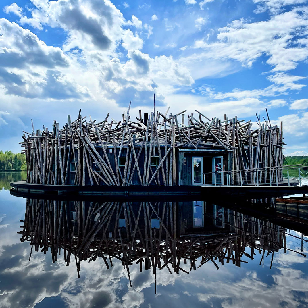 The Arctic Bath hotel in Harads, Sweden, where the ice-cold plunge pool and some bedrooms are suspended over the river (© Arctic Bath)