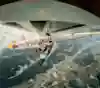 To make the perfect jump to the next hold at around 2,500m Domen Škofic leaps between climbing holds beneath the wing of a Blanik glider.