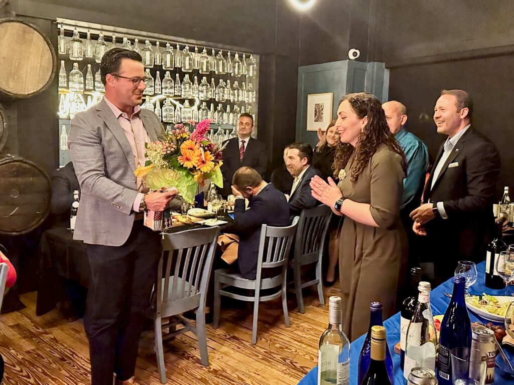 Mt. Airy CDC Executive Director Philip Dawson presents gifts to Dr. Vjosa Osmani-Sadriu, the&nbsp;sixth president of the Republic of Kosovo.