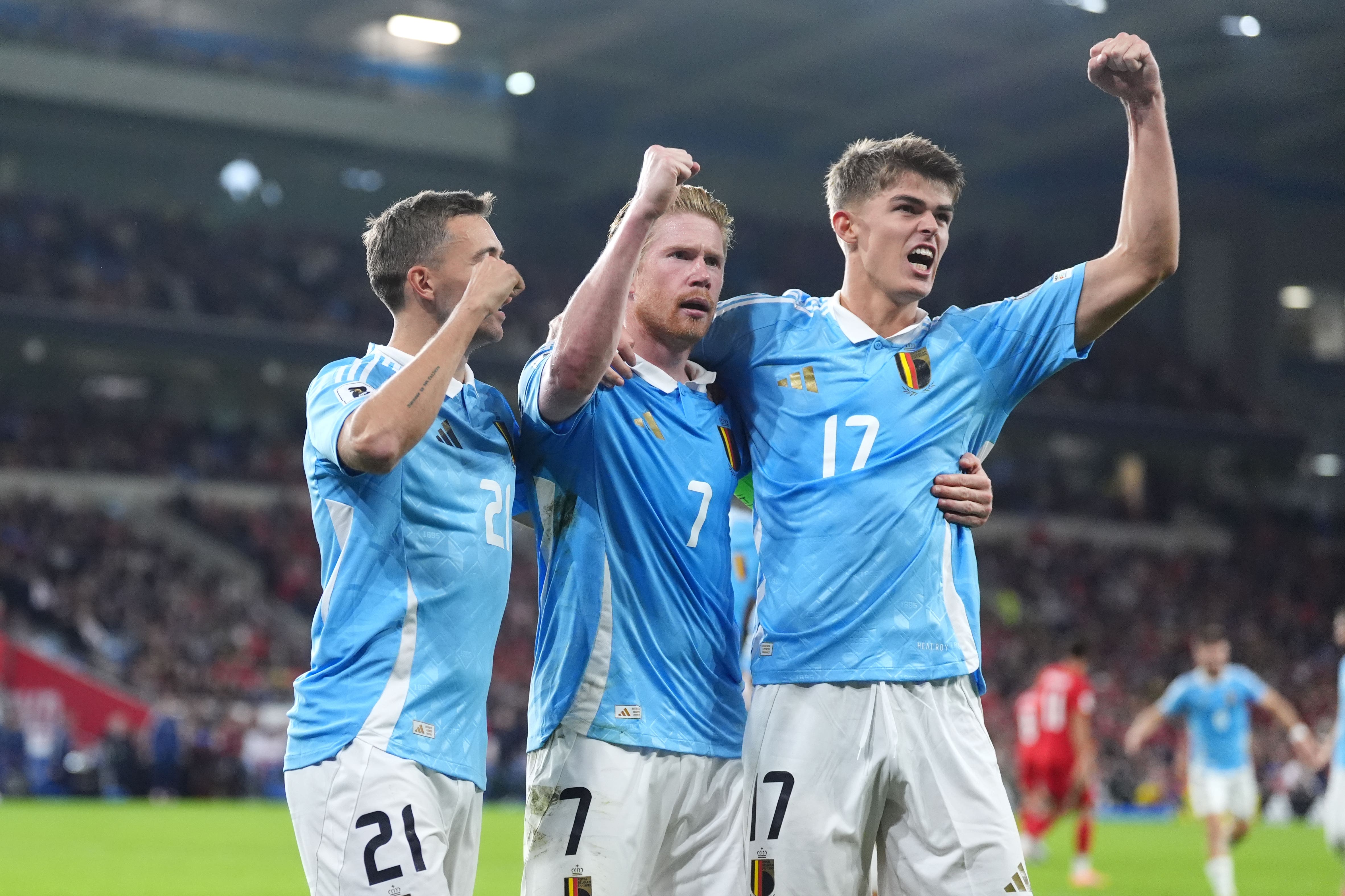 Kevin De Bruyne (centre) celebrates scoring Belgium’s third goal against Wales (Adam Davy/PA)