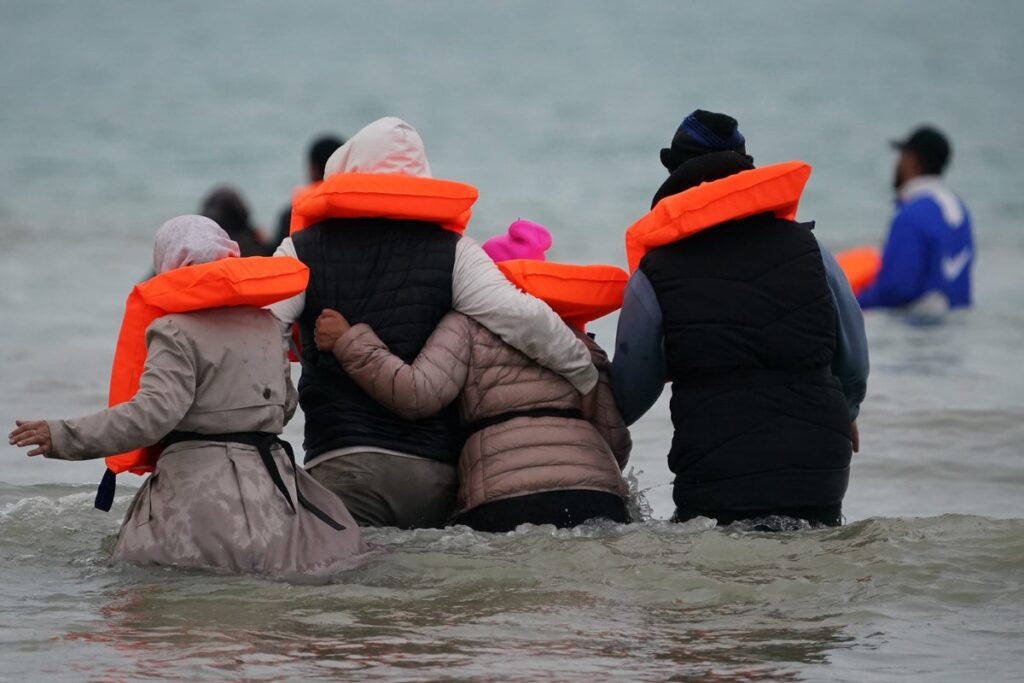 75 migrants deported to France and 51 allowed into UK under deal