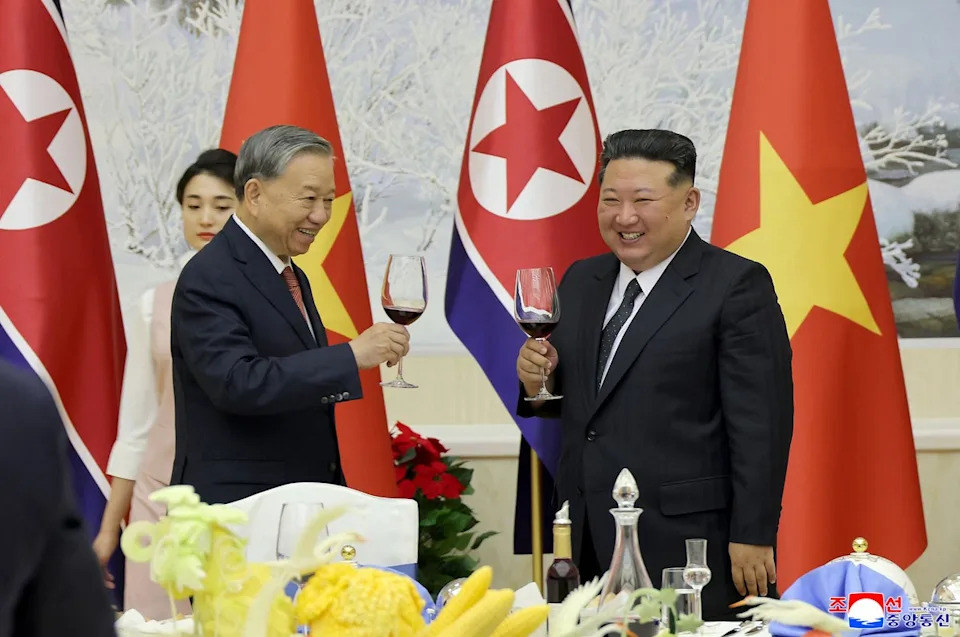 This picture taken on 9 October 2025 and released by North Korea’s official Korean Central News Agency (KCNA) on 10 October 2025 shows North Korean leader Kim Jong Un (R) and Vietnam’s Communist Party General Secretary To Lam (L) attending a welcome banquet at the headquarters of the Central Committee of the Workers’ Party of Korea in Pyongyang (KCNA VIA KNS/AFP via Getty Image)
