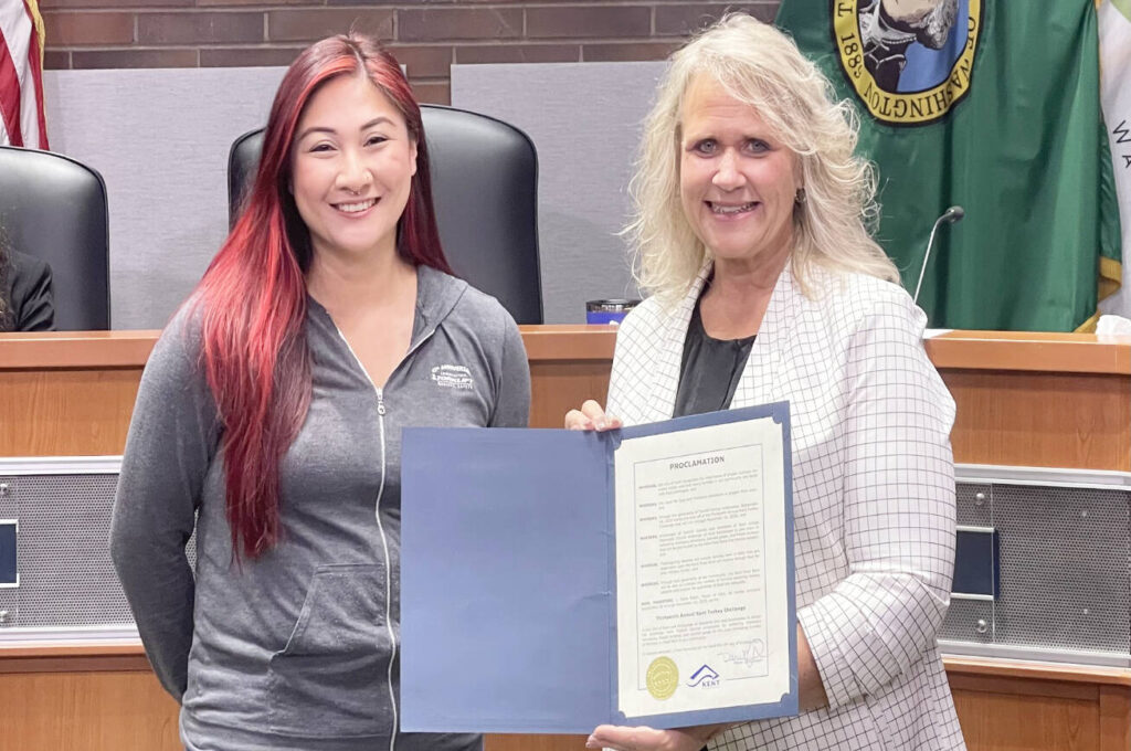 13th annual Turkey Challenge in Kent seeks food, money donations Jasmyne Faborito, organizer of the Torklift Central Turkey Challenge, left, and Kent Mayor Dana Ralph during the Oct. 7 City Council meeting to recognize the annual event to raise money and food for the Kent Food Bank. COURTESY PHOTO, City of Kent