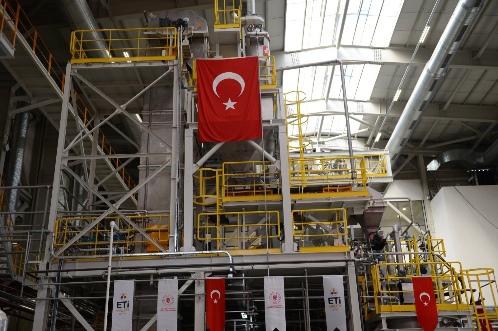 A Turkish flag is seen during the opening ceremony of the Eti Maden Lithium Production facility, Eskişehir, central Türkiye, Dec. 29, 2020. (AA Photo)