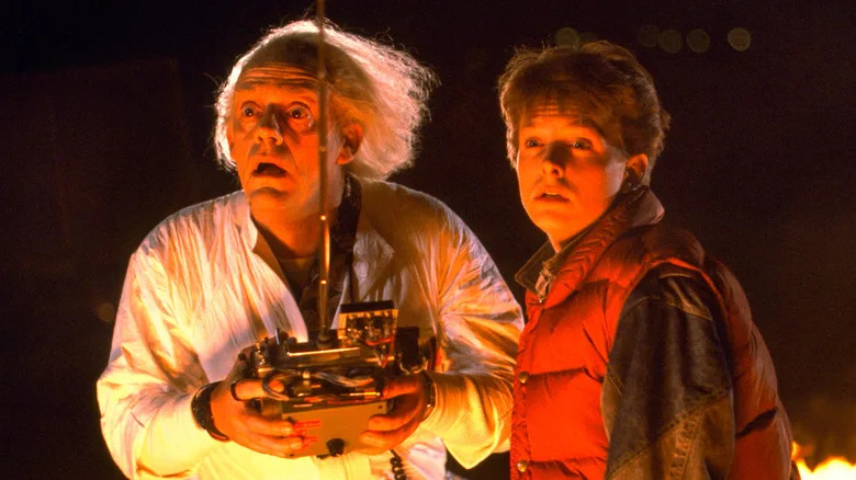 Doc Brown and Marty McFly watching the DeLorean take off in Back to the Future