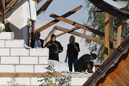 NATO Downs Russian Drones over Poland Police and army officials inspect damage to a house destroyed by debris from a Russian drone shot down Sept. 10 over the village of Wyryki-Wola in eastern Poland. NATO air defenses helped counter drones that Polish officials say violated Polish airspace overnight. (Photo by Wojtek Radwanski/AFP via Getty Images)
